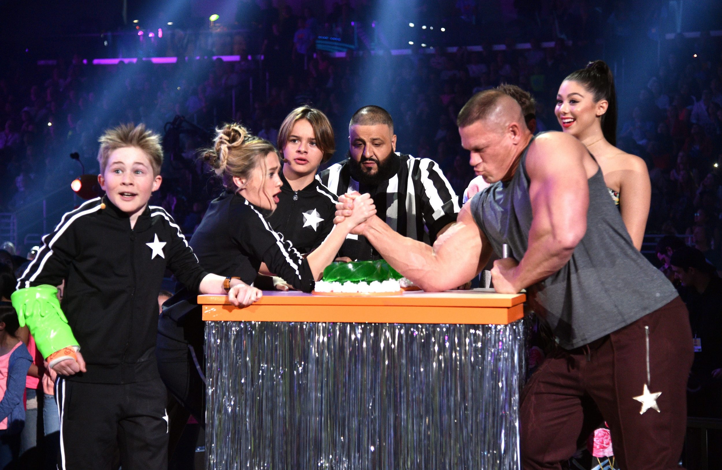 LOS ANGELES, CA - MARCH 11:  The cast of Nicky, Ricky, Dicky & Dawn armwrestle with host John Cena onstage with Dj Khaled at Nickelodeon's 2017 Kids' Choice Awards at USC Galen Center on March 11, 2017 in Los Angeles, California.  (Photo by Kevin Mazur/KCA2017/WireImage - Issued to Media by Nickelodeon)