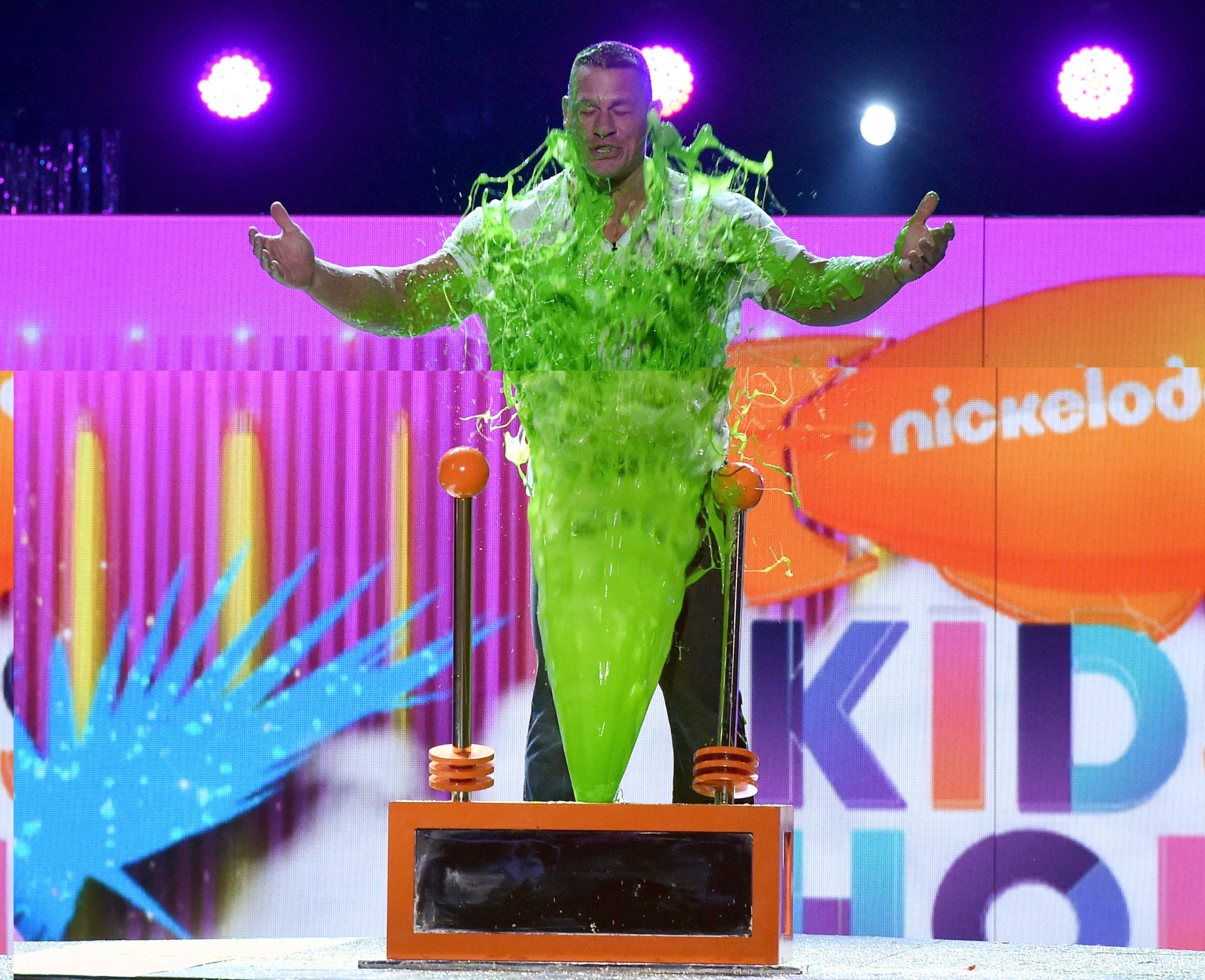 LOS ANGELES, CA - MARCH 11:  Host John Cena gets slimed onstage at Nickelodeon's 2017 Kids' Choice Awards at USC Galen Center on March 11, 2017 in Los Angeles, California.  (Photo by Kevin Winter/Getty Images - Issued to Media by Nickelodeon)