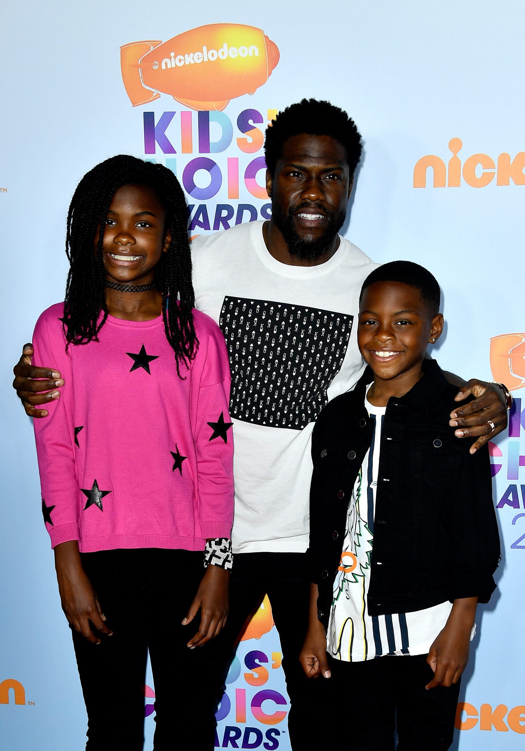 LOS ANGELES, CA - MARCH 11:  Actor Kevin Hart (C) with Heaven Hart and Hendrix Hart at Nickelodeon's 2017 Kids' Choice Awards at USC Galen Center on March 11, 2017 in Los Angeles, California.  (Photo by Frazer Harrison/Getty Images - Issued to Media by Nickelodeon)